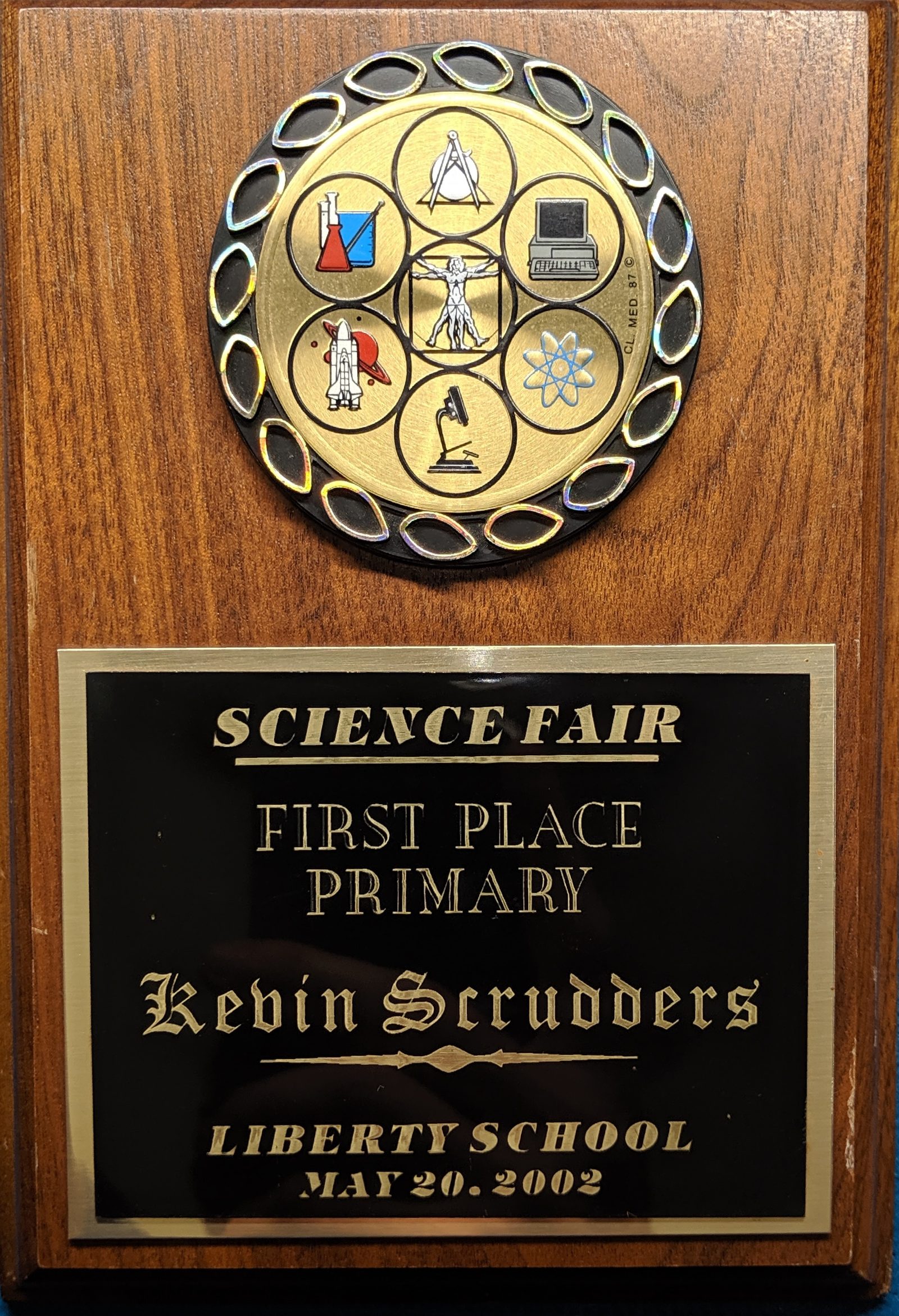 Kevin Scrudders with his first-place science fair project