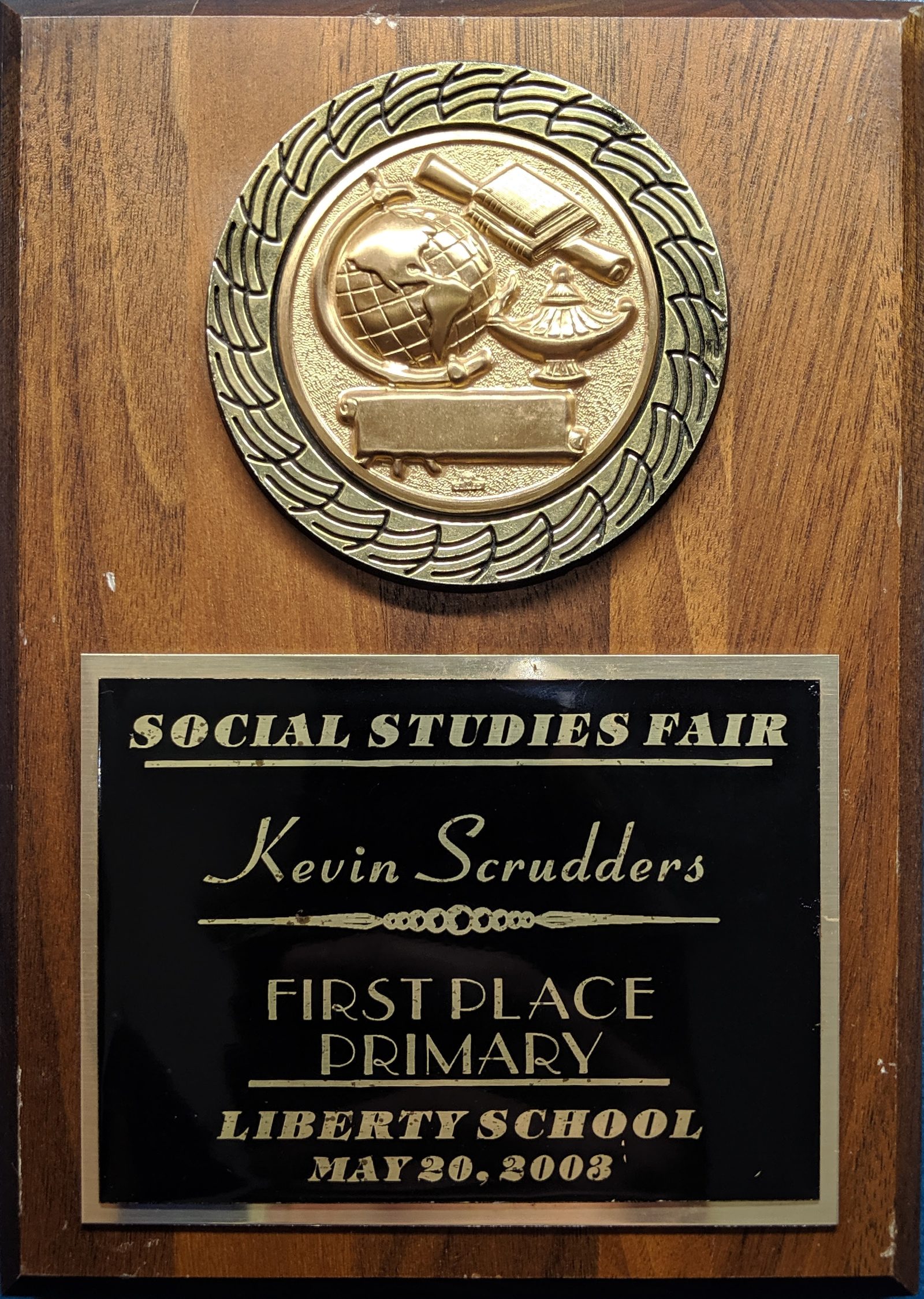 Kevin Scrudders with his first-place social studies fair project