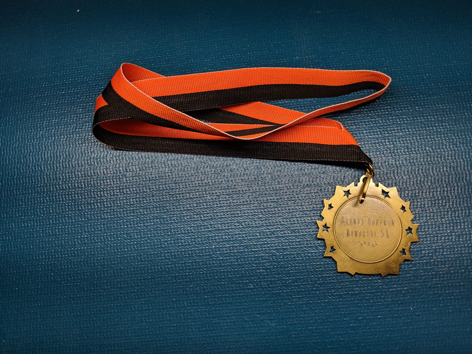 The 2016 Brenda Hoffman Memorial 5K medal