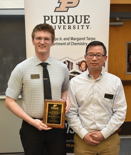 Kevin Scrudders receiving the chemistry safety award from the department head
